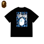 Stussy × BAPE 聯名款 藍迷彩猿人頭LOGO印花短袖T恤-黑色